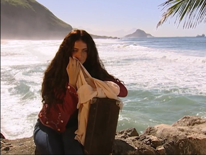 Jade waits by the sea at Prainha