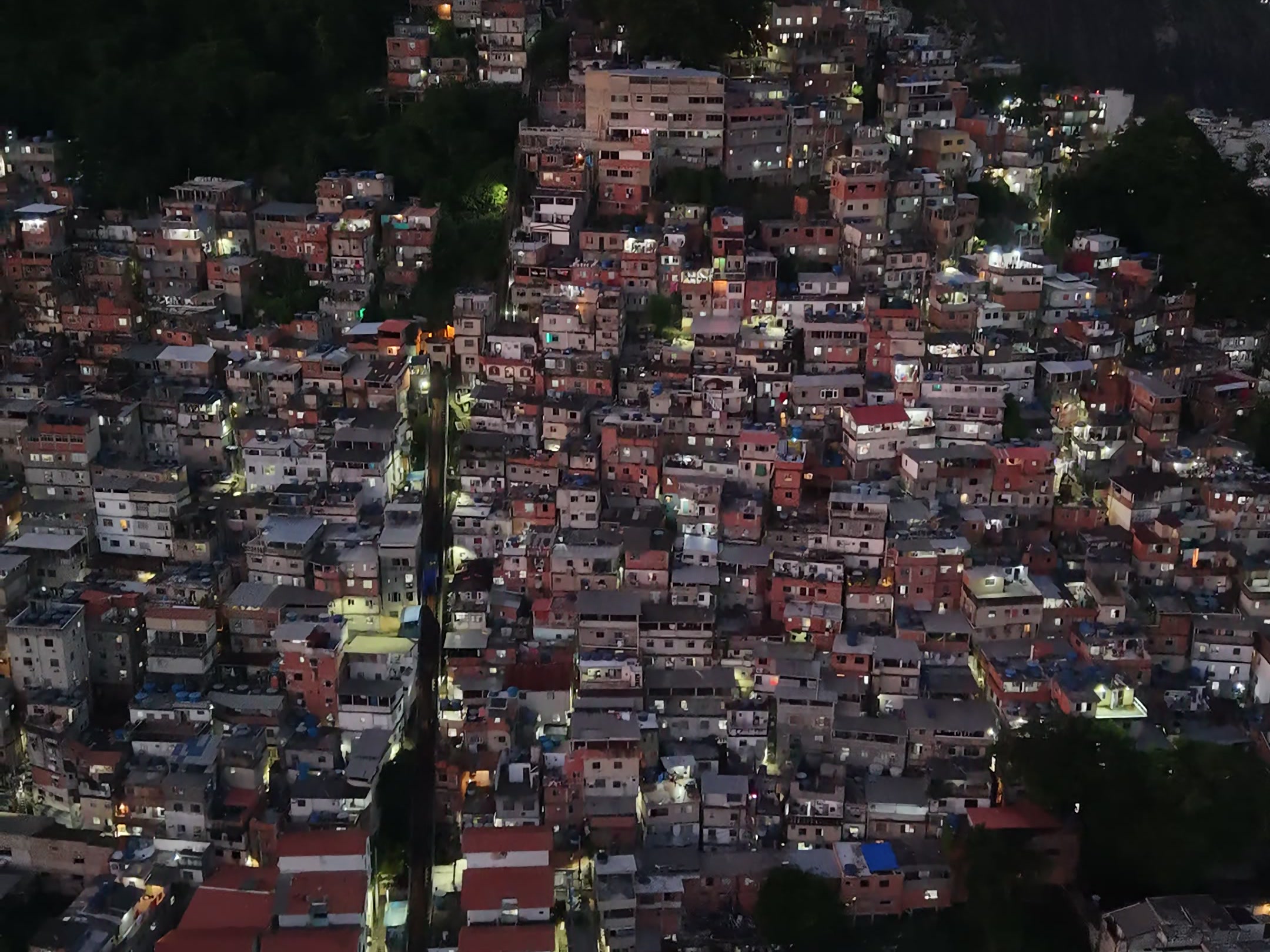 Night aerial view of the Pavão-Pavãozinho–Cantagalo favela in Rio de Janeiro