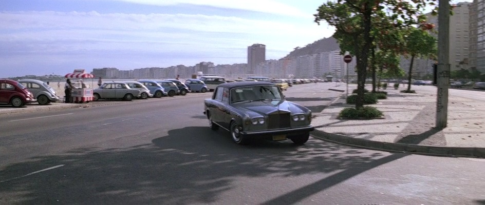 Bond passes the Copacabana promenade