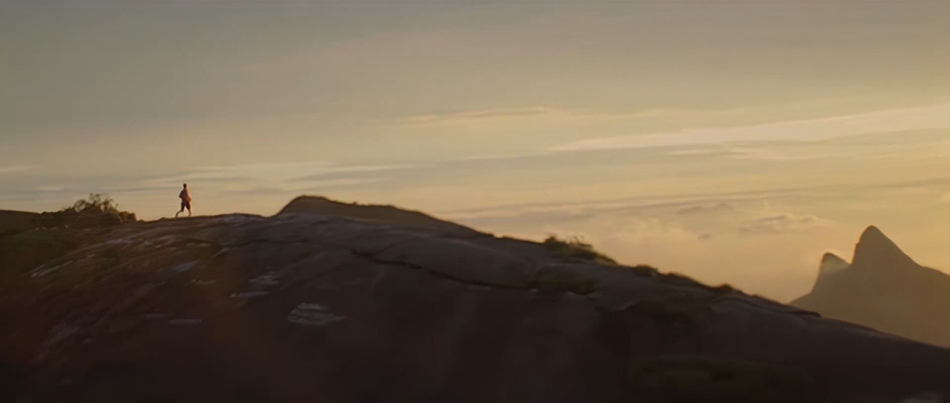 Bruce Banner runs across the summit of Pedra Bonita