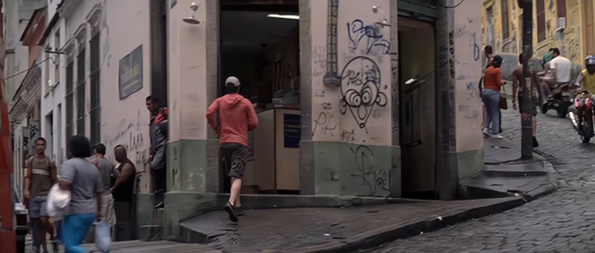 Banner enters the shop near the Lapa Arches